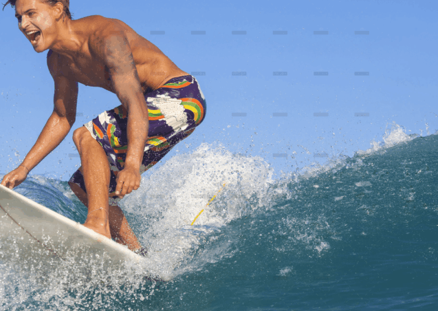 demo-attachment-690-surfing-excited-man-catching-wave